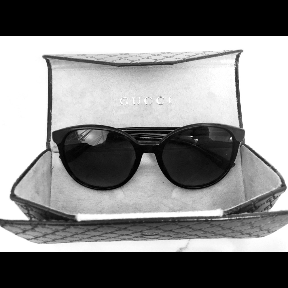 Gucci sunglasses with case.